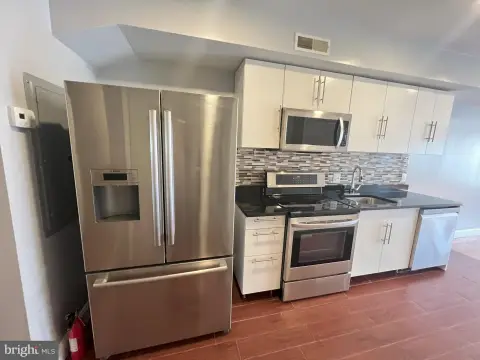 Well-Maintained Quadruplex Investment Opportunity