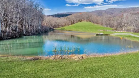 Mountaintop Property with Private Lake