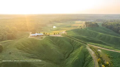 Improved Ranch with Lodge and Timber