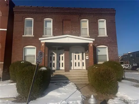 Stately Three-Family Residence in Gate District