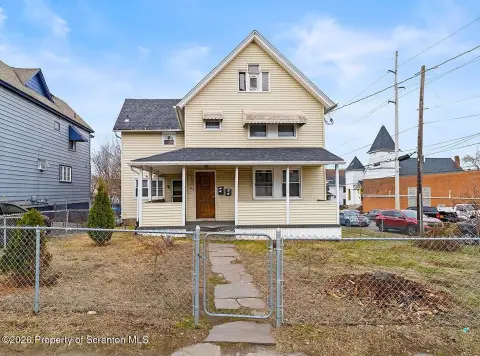 Income-Producing Duplex with Commercial Zoning