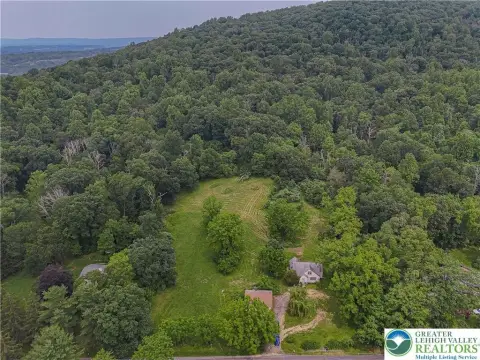 Enchanting Acreage Bordering State Park