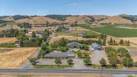 Commercial Land with Three Existing Structures