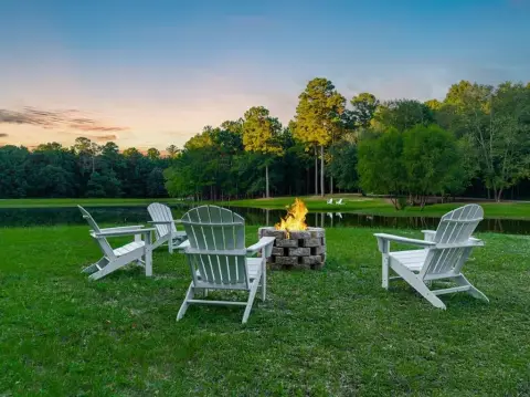 Acreage with Residence and Lake