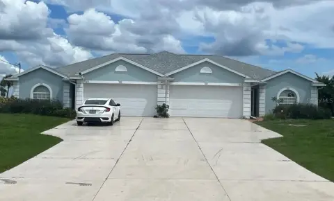 Custom-Built Duplex with Golf Course View