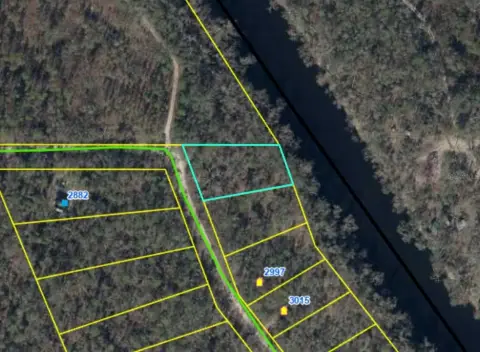 Wooded Riverfront Land