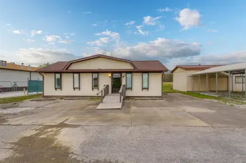 Commercial Land with Existing Buildings