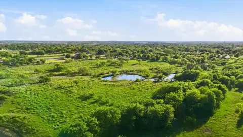 Ranch Acreage with Barns and Ponds