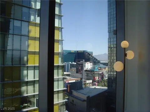 Luxury High-Rise Condo with Strip View