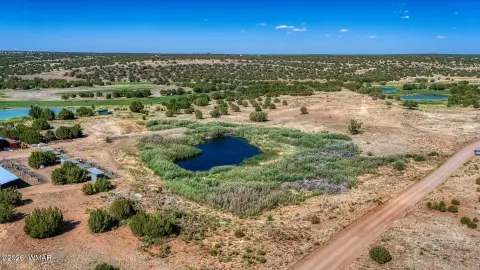 Land with Pond Near Golf