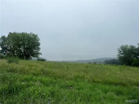 Land with Pond and Creek