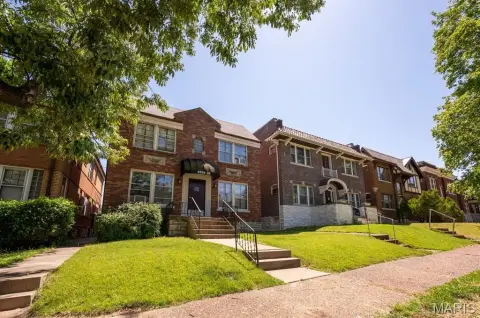 Brick Quadplex with Garage Spaces