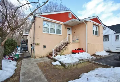 Well-Maintained Income-Producing Two-Family Property