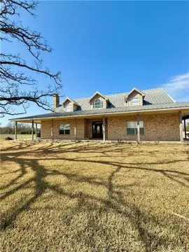 Madisonville Land with Spacious Home