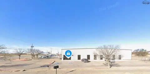 Fenced Warehouse with Grade-Level Doors