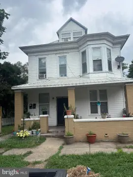 Three-Unit Triplex with Detached Garage