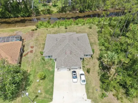 Block-Built Duplex with Canal Views