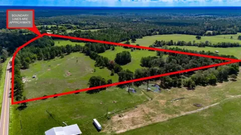 Fenced Agricultural Land with Pond