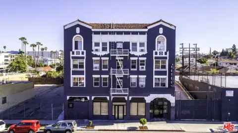 65-Unit Apartment Building with Retail