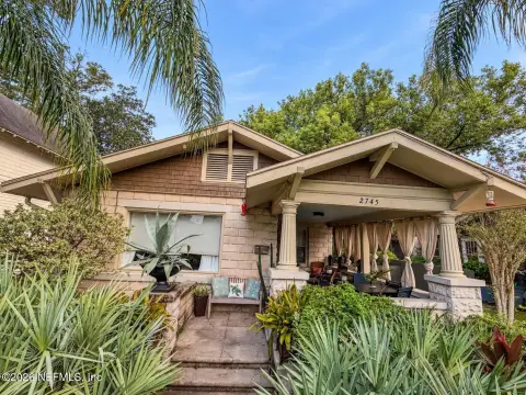 Duplex with Two-Story Cottage