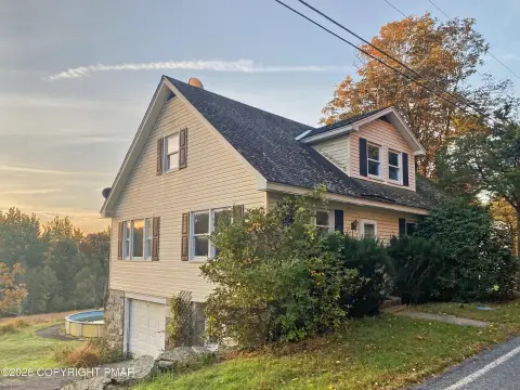 Triplex Property with Farmhouse