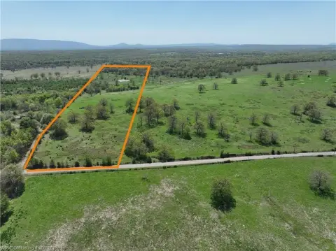 64-Acre Land with Pond