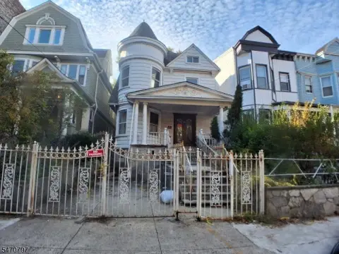 Duplex Requiring Full Renovation