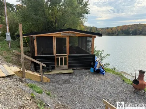 Waterfront Land with Screened Porch