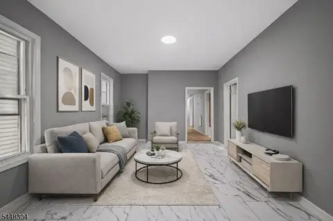 Three-Family Triplex with Renovated Units