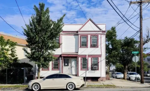 Duplex with Fenced Parking Lot
