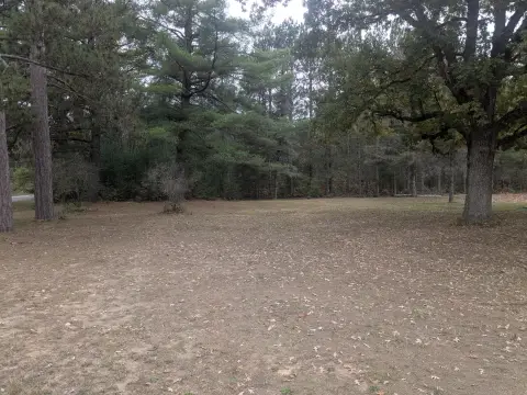 Wooded Land with Utilities