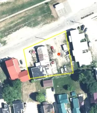 Commercial Building with Gravel Lot