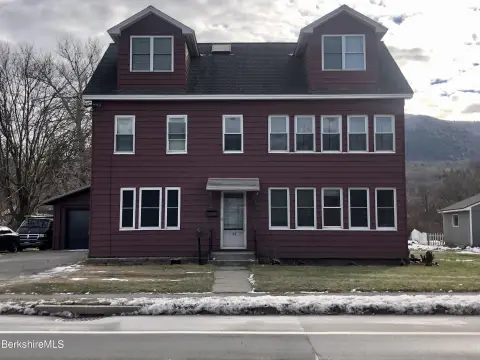 Two-Unit Colonial with Private Deck