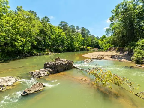 Scenic Acreage with Water Frontage
