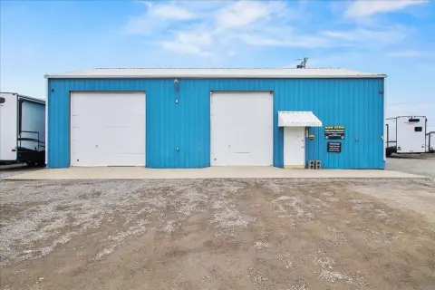 Versatile Metal Building on Gravel Lot