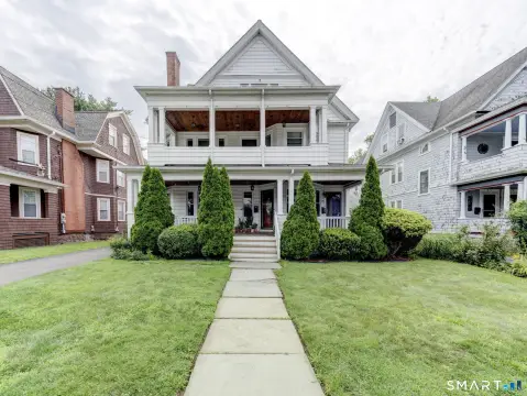 Updated Duplex With Detached Garage