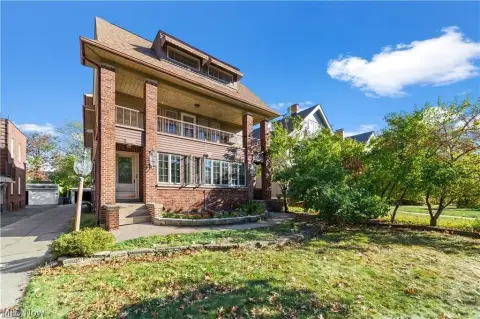 Brick Triplex with Four-Car Garage