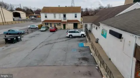 Multi-Unit Property with Storefront & Land