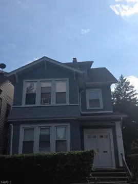 Triplex With Detached Two-Car Garage