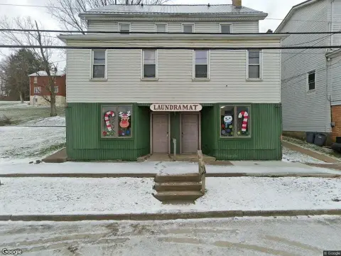 Laundromat with Two Apartments