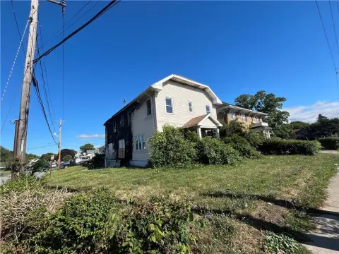 Fire-Damaged Two-Family Investment Opportunity