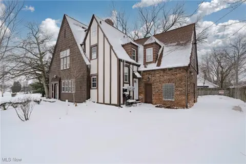 Charming Tudor-Style Duplex with Income