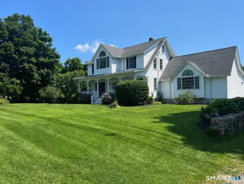 Craftsmanship-Filled Duplex With Rental Unit