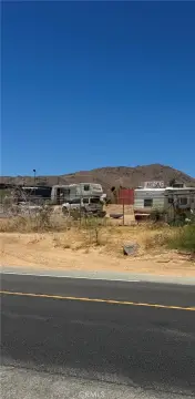 Versatile Commercial Land with Buildings