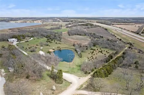 Picturesque 40-Acre Farm with Pond