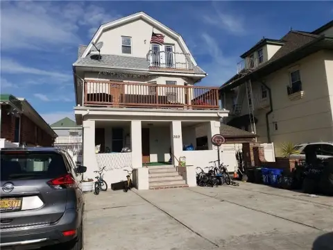 Detached Triplex with Deck