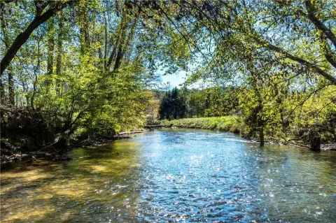 Unrestricted Land with River Frontage