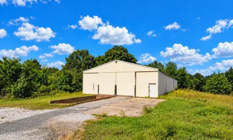 Warehouse with Fenced Acreage