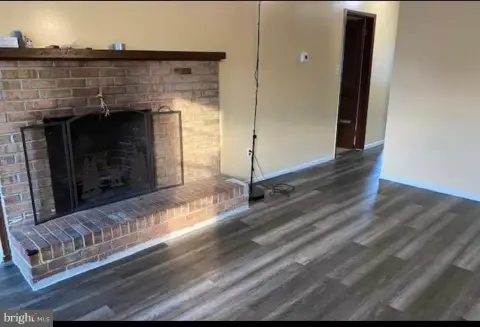 Duplex With Wood-Burning Fireplaces