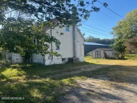Commercial Land with Garage Structure